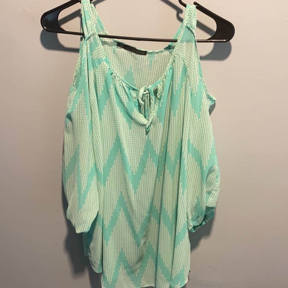 Peekaboo shoulder top
